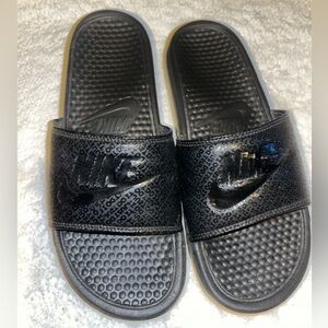 Black Nike slides